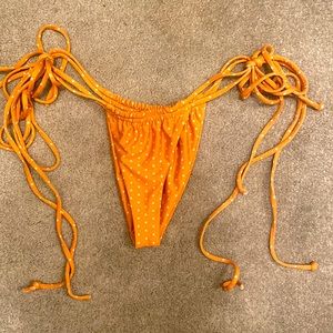 Golden polkadot bikini bottoms, stone fox swim size small